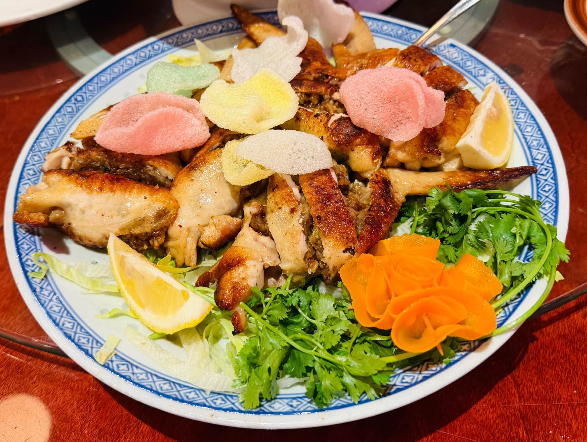 A platter of roast meats with garnish