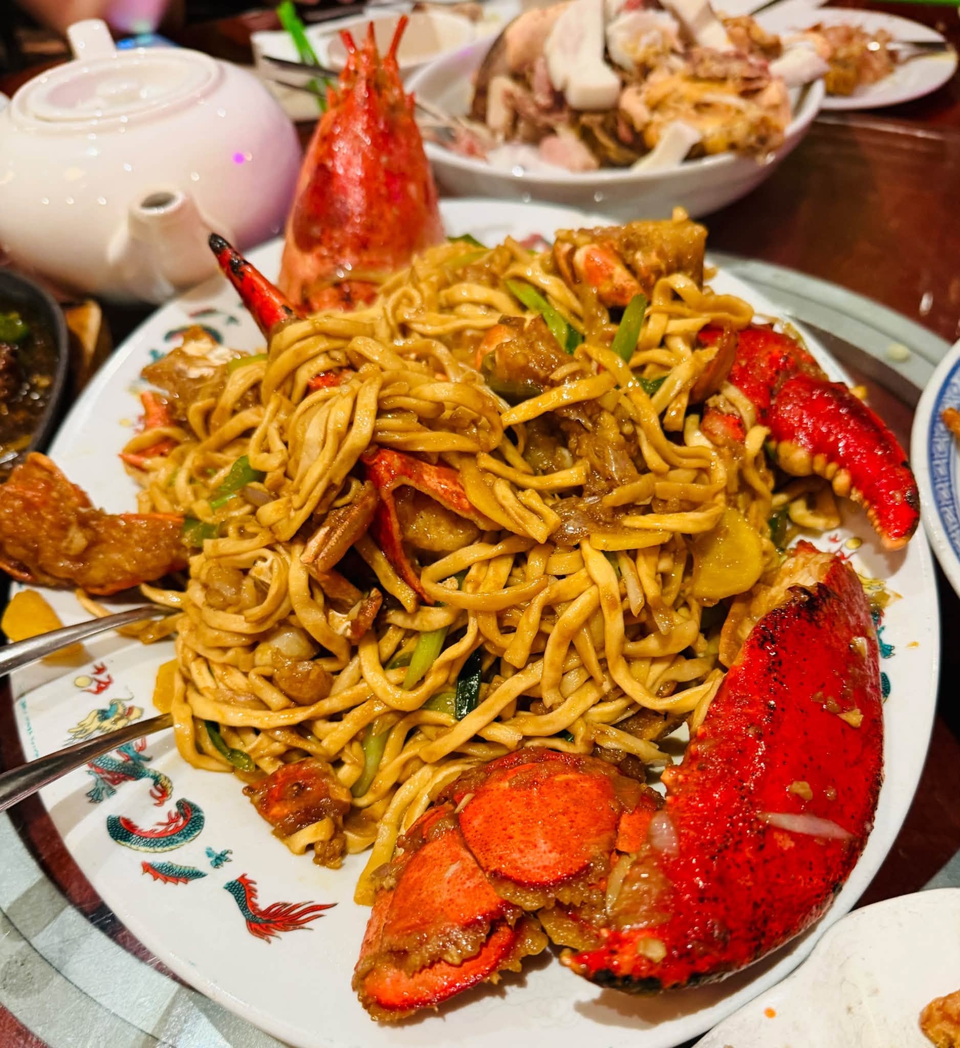 A platter of stir-fried noodles with seafood